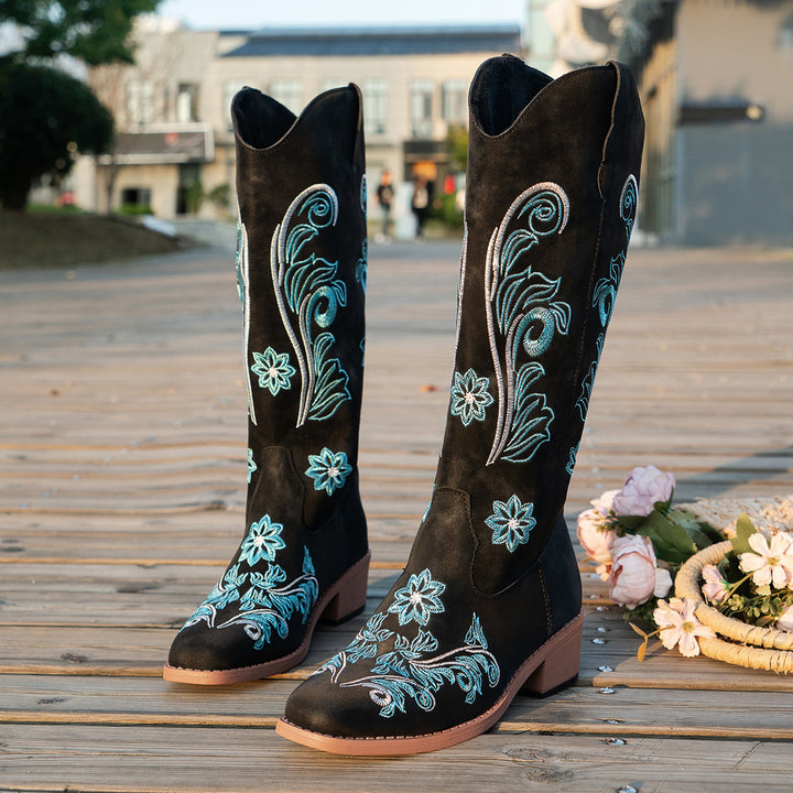 Women's cowboy boots with handmade floral details and a comfortable block heel Lune London