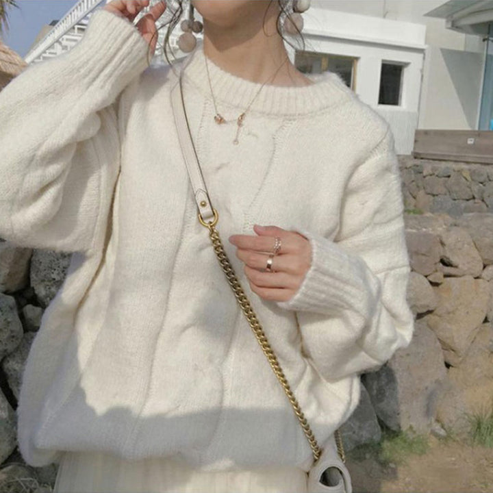 Pull femme en maille épaisse avec texture côtelée et détails décoratifs Chic & Stil