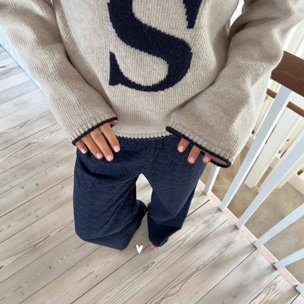 Trendy knit sweater for women with graphic design and relaxed fit pants Lune London