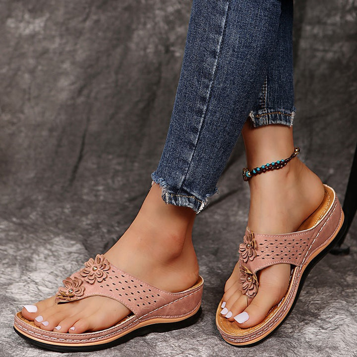 Strappy sandals for ladies with an elegant floral appliqué and anatomical foot support Lune London