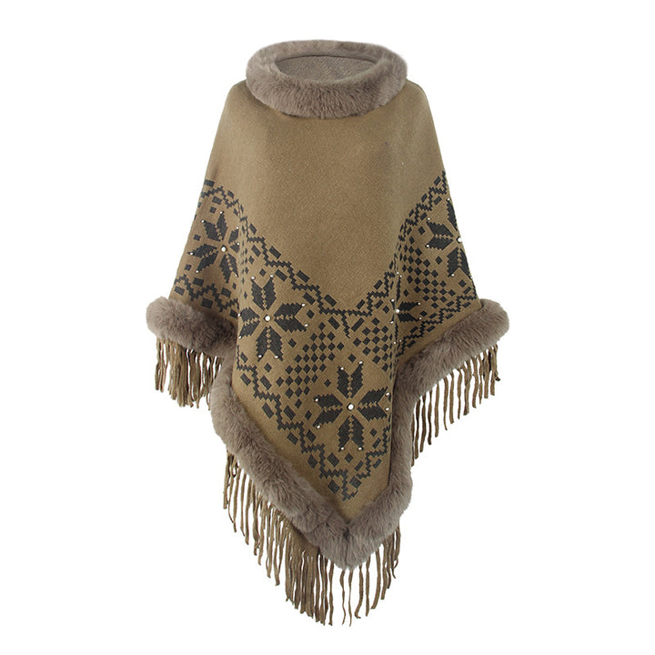 Elegant women's poncho with decorative fringe design and faux fur trim Lune London