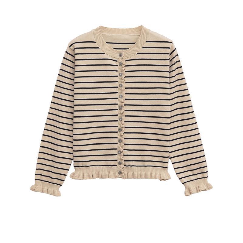 Women's knit jacket with a playful ruffled hem and chic button details Lune London