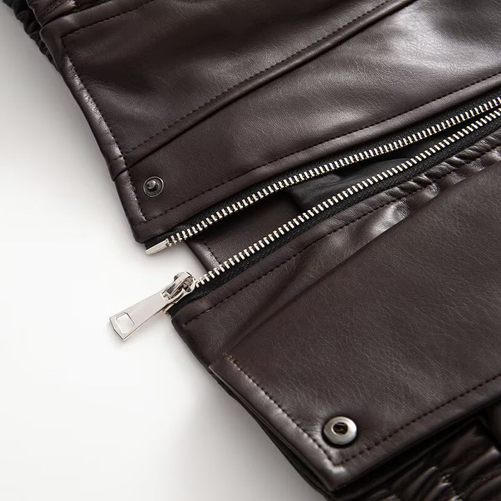 Veste en faux cuir pour femme avec design innovant et poches pratiques Chic & Stil