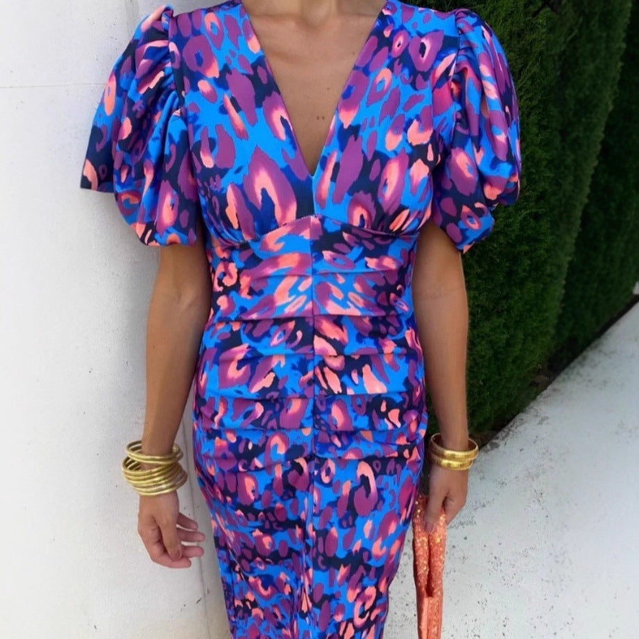 Midi dress for women with exciting puffed sleeves and a deep V-neck Lune London