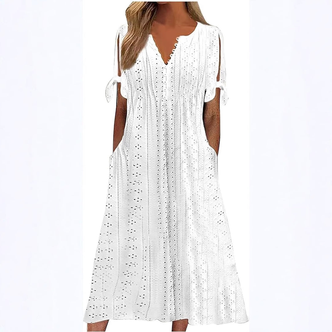 Airy midi dress for women with decorative hole patterns and practical pockets Lune London