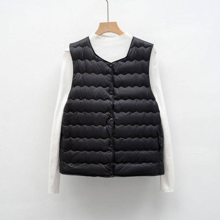 Ladies light quilted jacket with elastic inserts Lune London