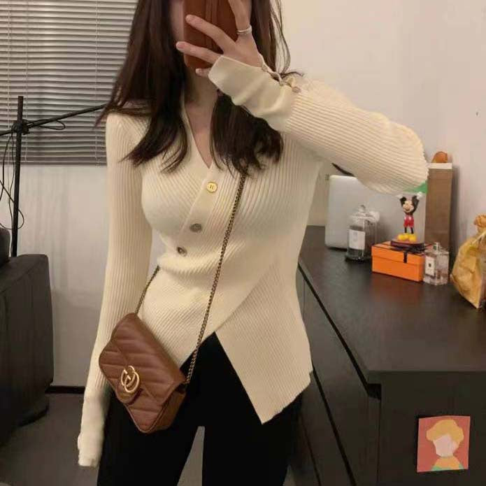 Women's knitted jacket with asymmetrical cut and decorative buttons Lune London