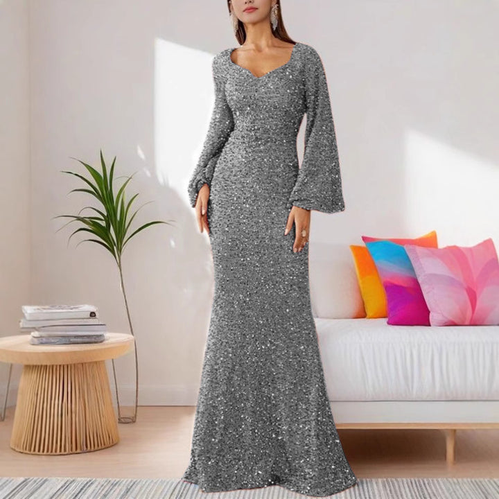 Ladies Glamorous Glitter Evening Dress with Swinging Skirt and Voluminous Sleeves Lune London