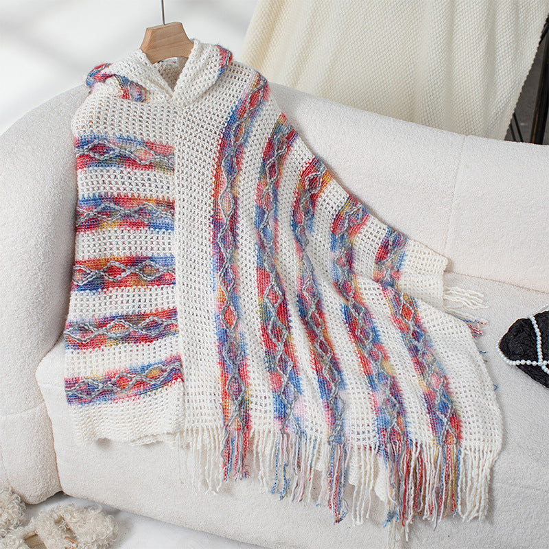 Ladies knitted poncho with hood and fringe design Lune London