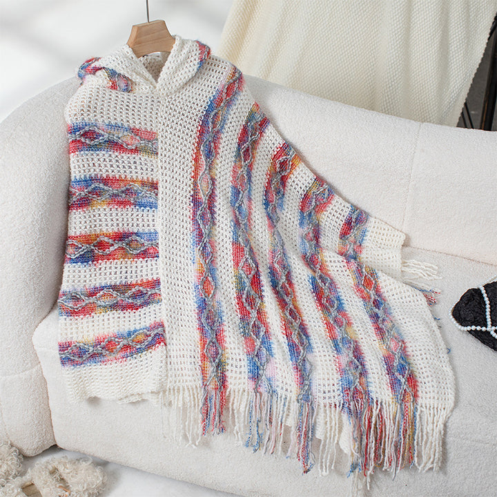 Ladies knitted poncho with hood and fringe design Lune London
