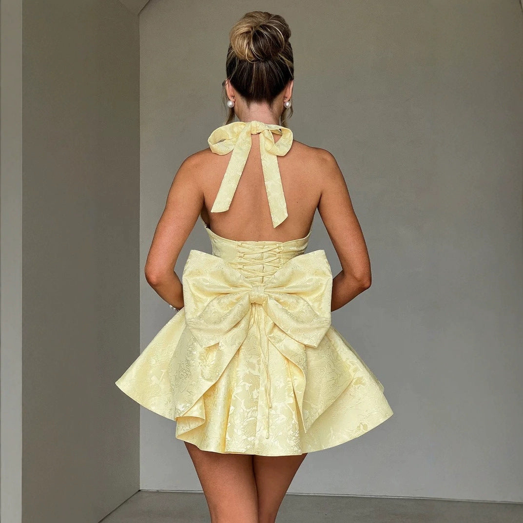 Women's skater dress with deep V-neckline and decorative bow elements