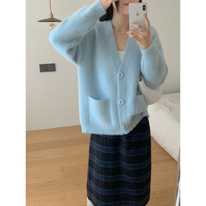 Cardigan pelucheux à boutons pour femmes avec poches élégantes Chic & Stil