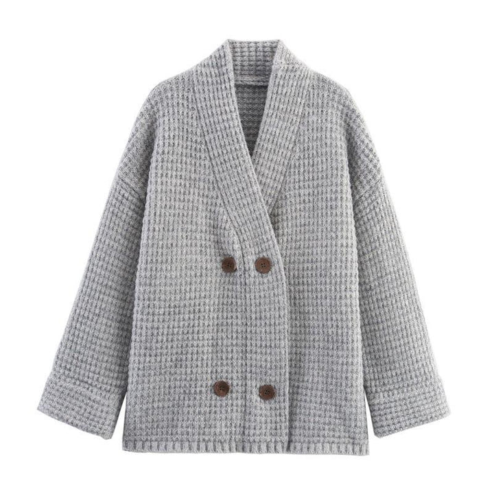 Ladies quilted knit with decorative button closure and high collar Lune London