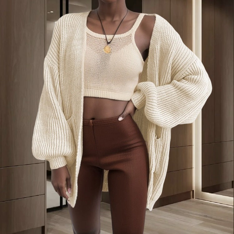 Cardigan pour femmes en tricot épais avec des manches volumineuses et des poches pratiques Chic & Stil