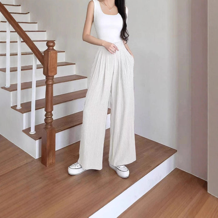 Wide pleated trousers for women with high pockets and elastic waist Lune London