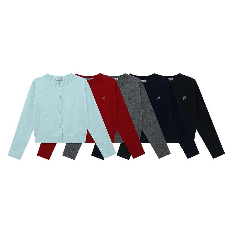 Women's knitted jacket with a fine ribbed pattern and contrasting button details Lune London