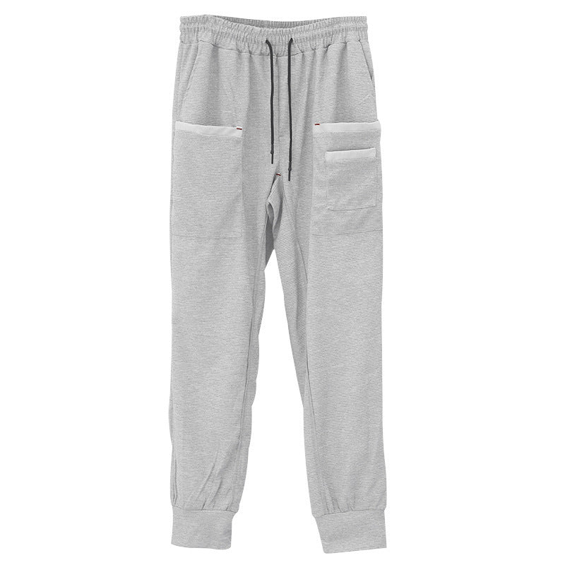 Casual men's jogger pants with practical side pockets and elastic waistband Lune London