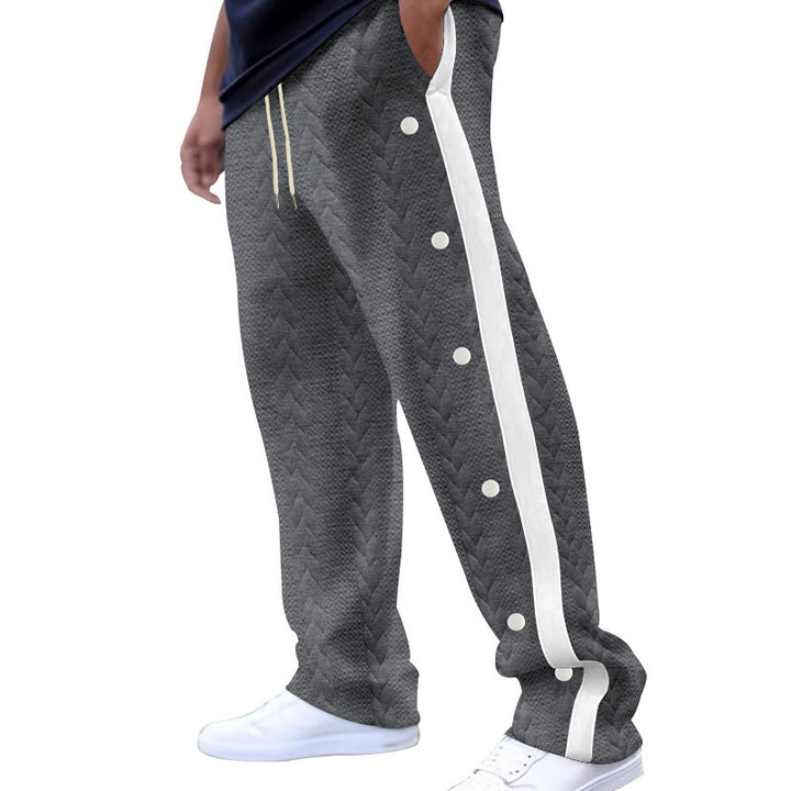 Men's breathable jogger pants with side snap buttons and unique knit design Lune London