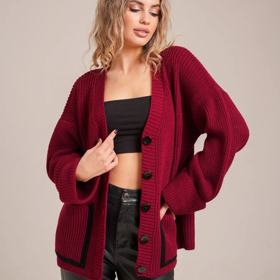 Ladies chunky knit cardigan with front openings and large buttons Lune London