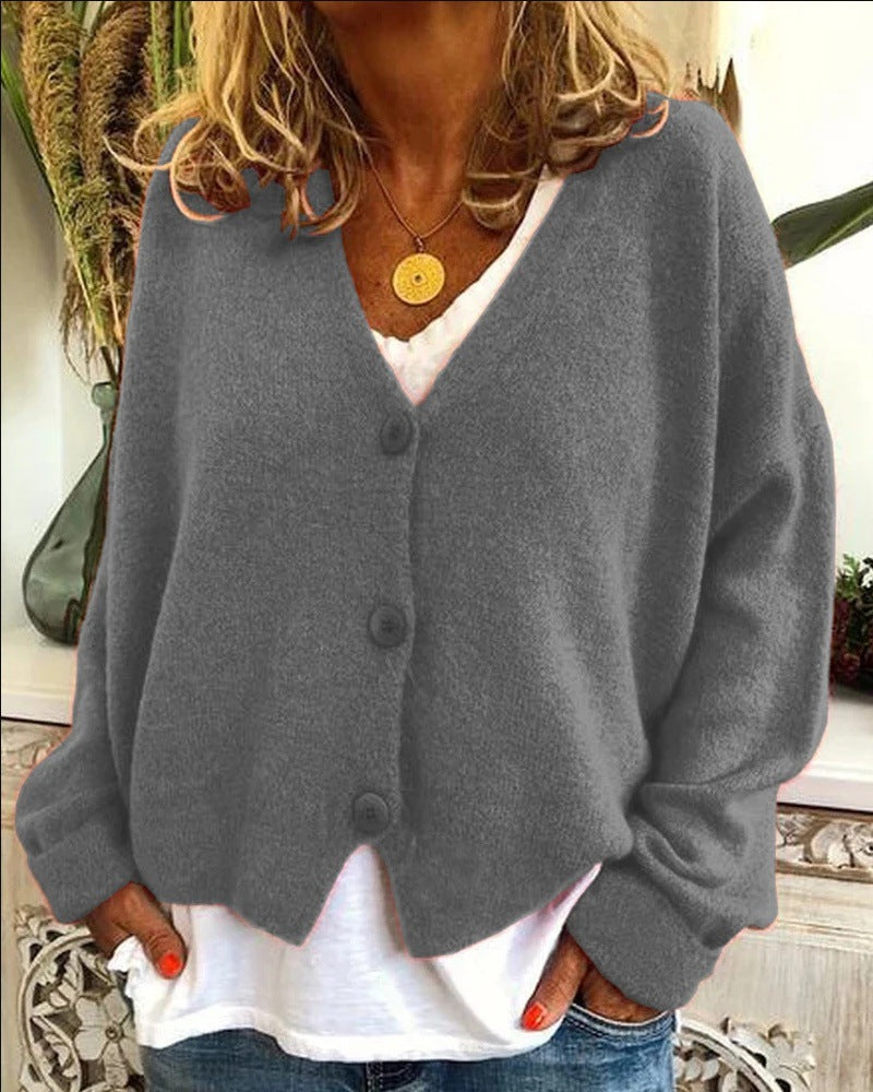 Casual knitted cardigan for women with open design and button closure Lune London