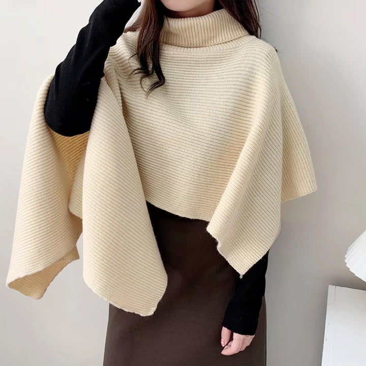 Ladies knitted poncho with high collar and elegant ribbed texture Lune London