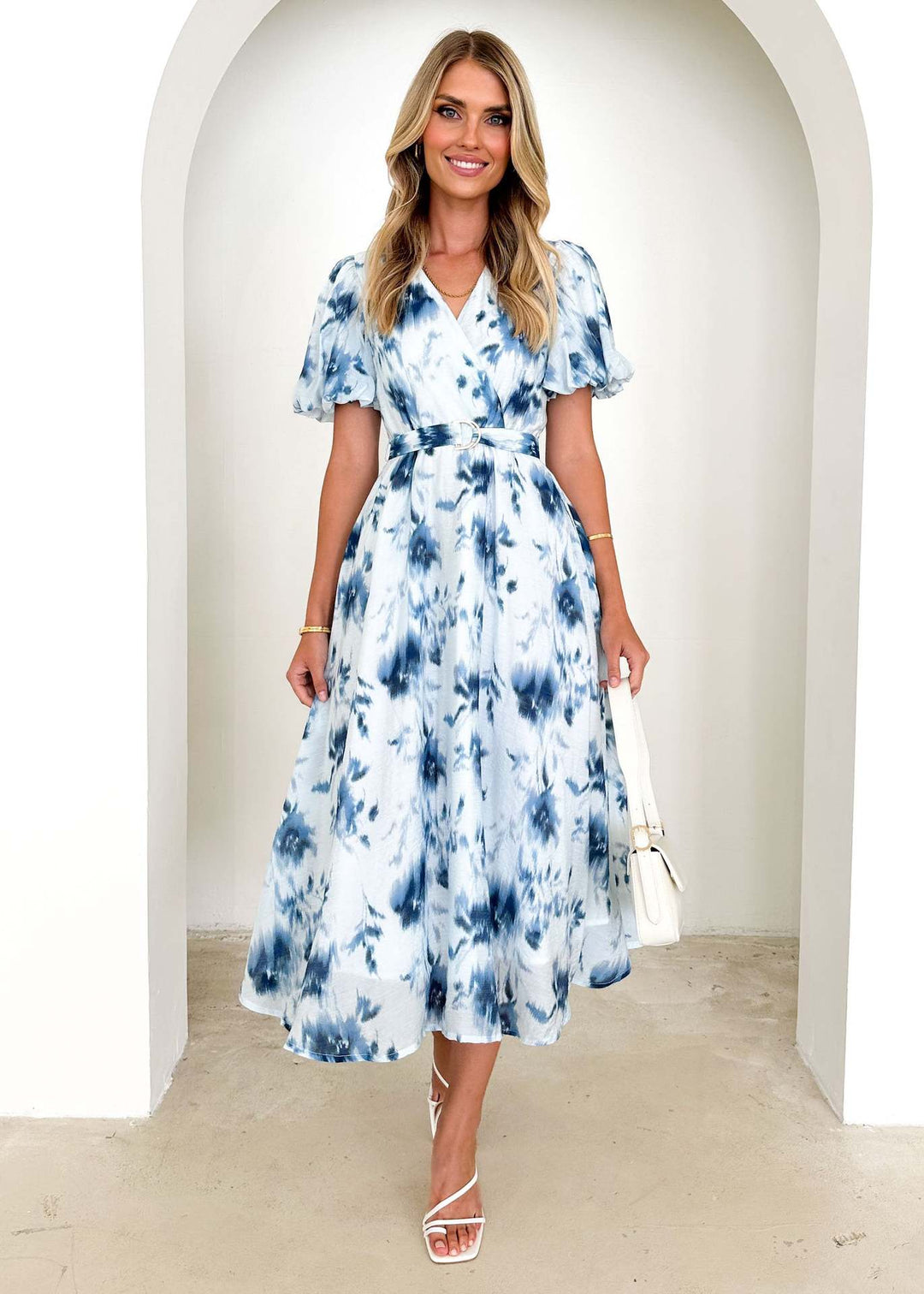 Midi dress for women with a playful wrap design and floral accents Chic & Stil