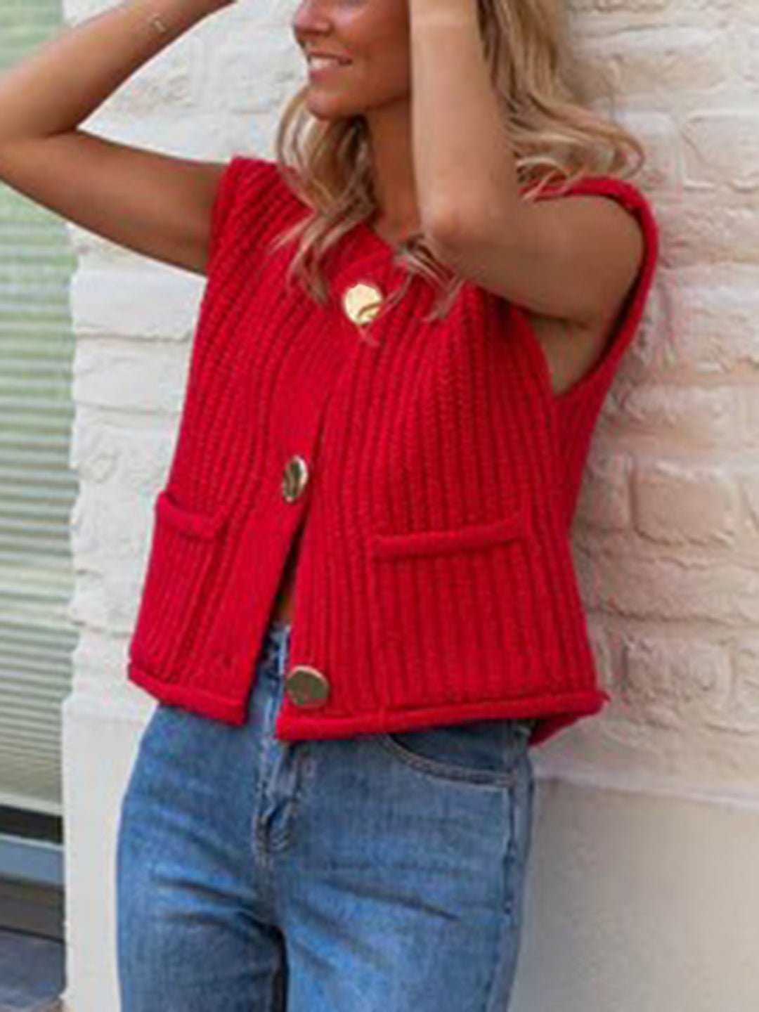 Knitted vest for women with decorative buttons and practical pockets Lune London