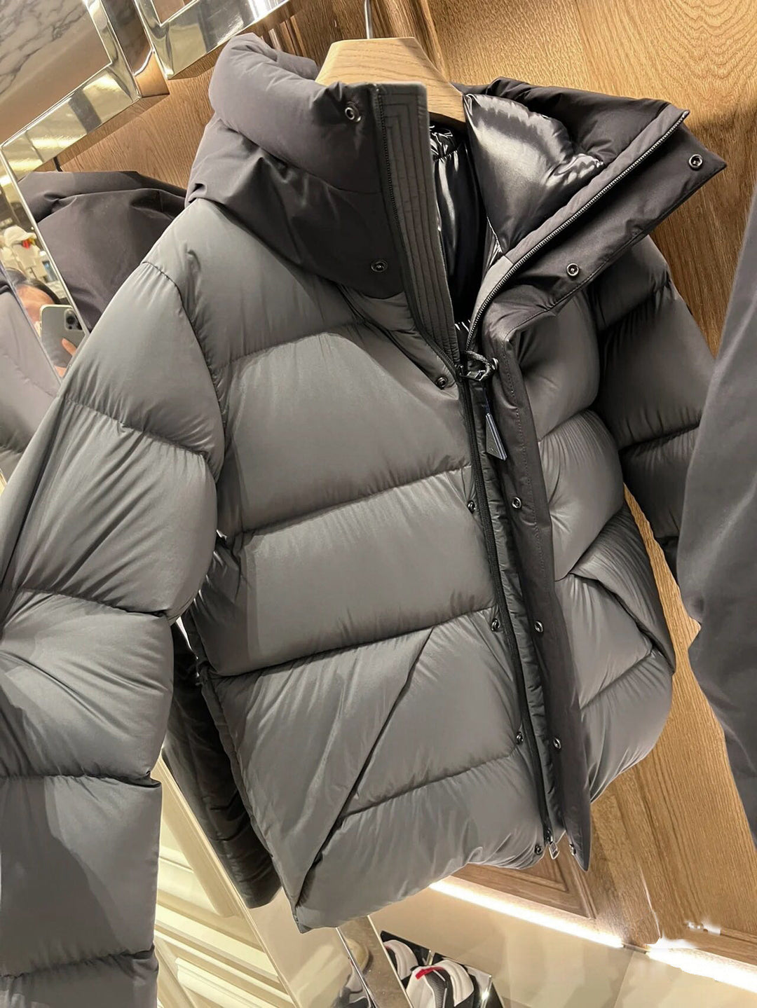 Ladies down jacket with high collar and practical zippered pockets Lune London