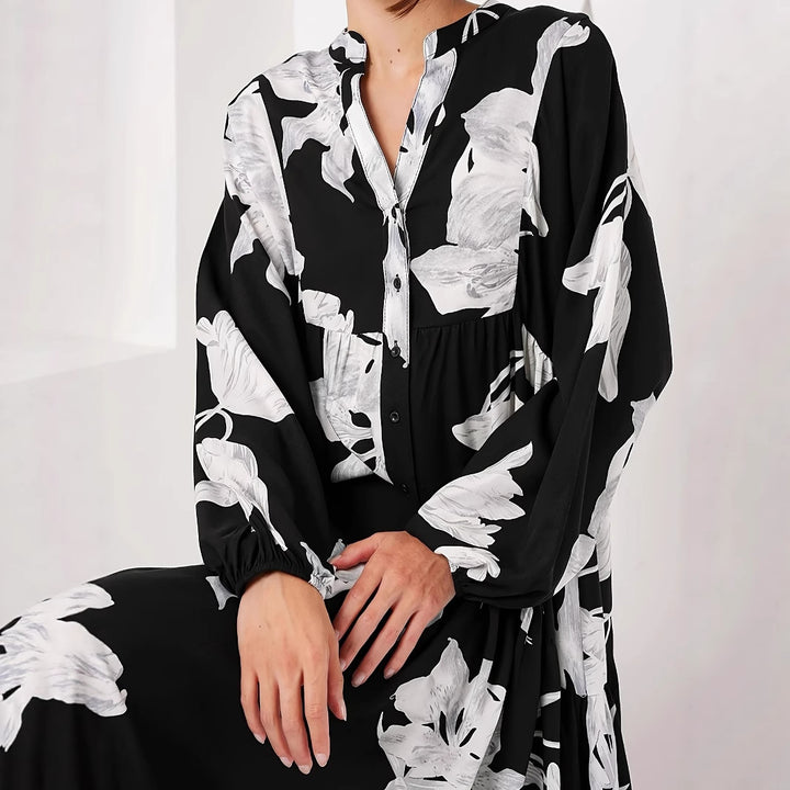 Women’s maxi dress with floral print and elegant button design Lune London