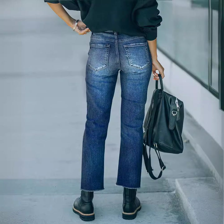 Modern high-waisted jeans for women with a chic and stylish worn look