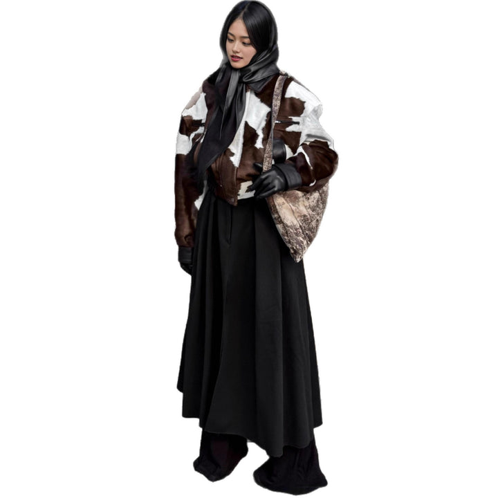 Ladies stylish faux leather jacket with a modern design in chic animal fur