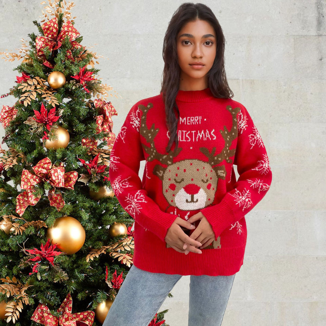 Christmas sweater for women with a cute reindeer pattern and winter snowflakes Lune London