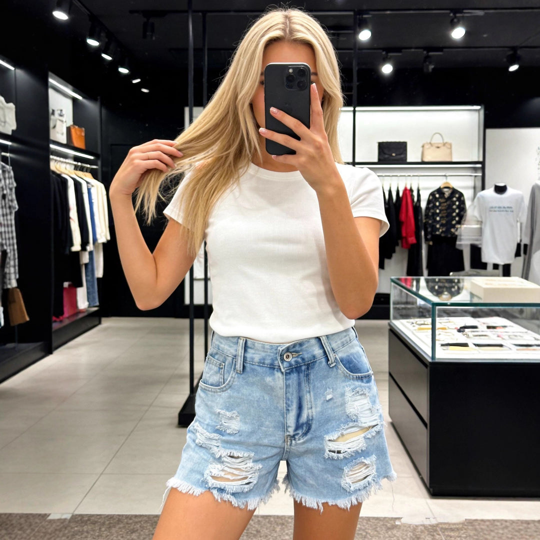 Ladies Destroyed Denim Shorts with High Pockets and Frayed Hem Lune London