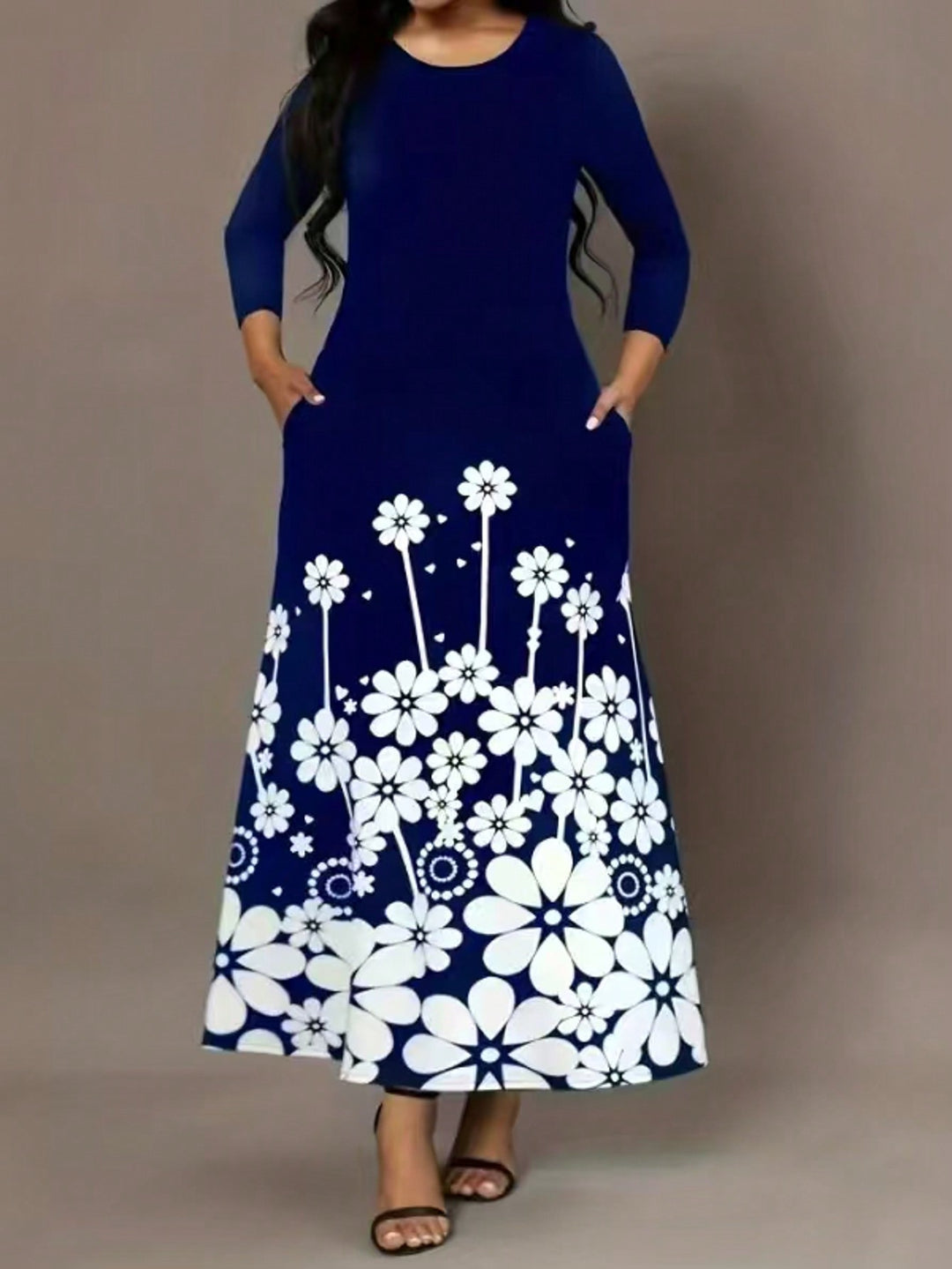 Maxi dress for women with floral design and practical side pockets Lune London