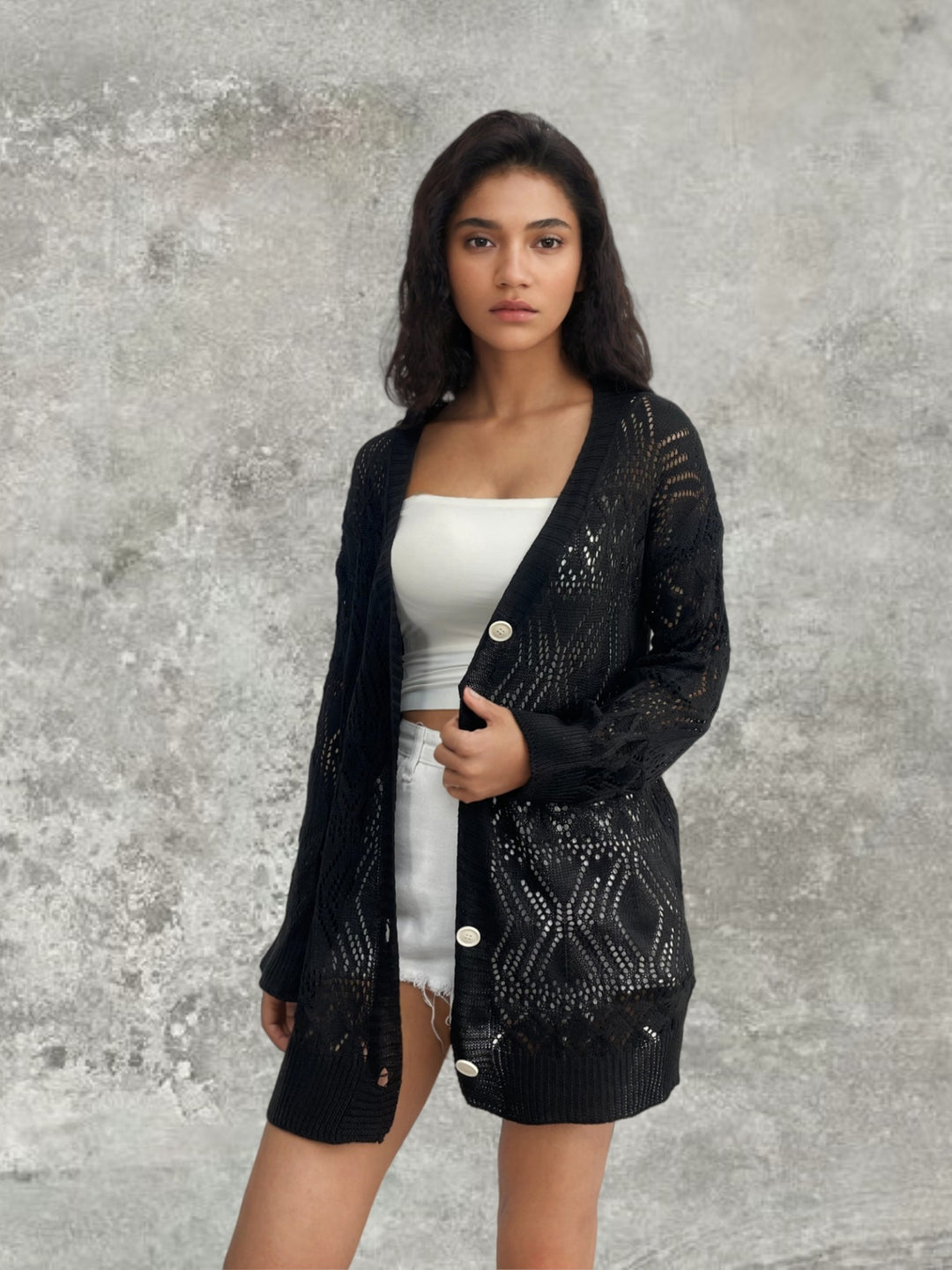 Knitted jacket for women with perforated pattern and button closure Lune Londonl