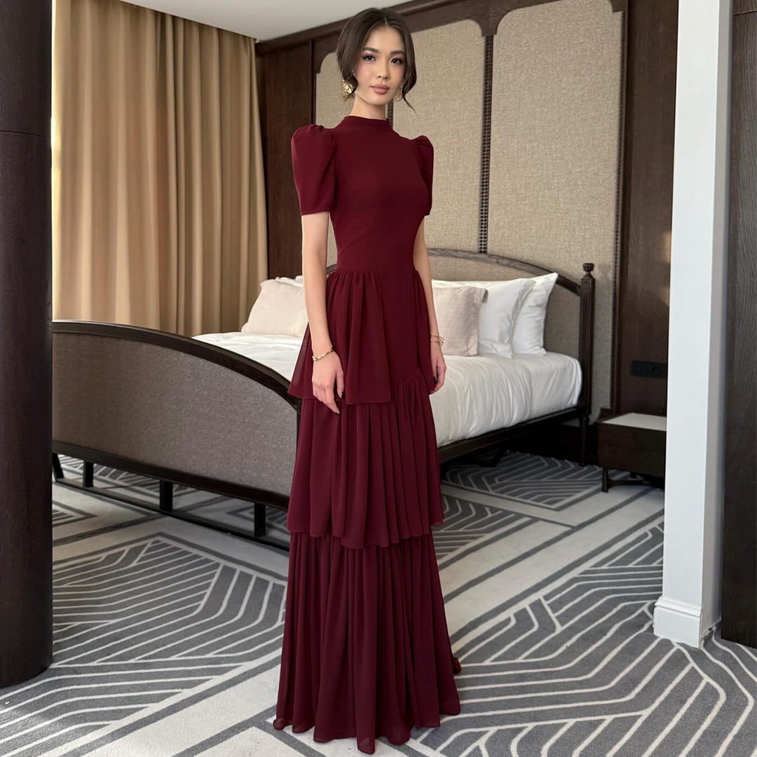 Women's maxi dress with voluminous ruffle details and elegant cut