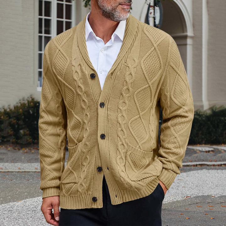 Men's chunky knit jacket with an elegant cable pattern and practical pockets Lune London