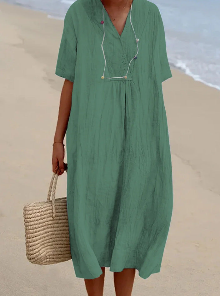 Casual beach dress for women with V-neck and wide hem Lune London