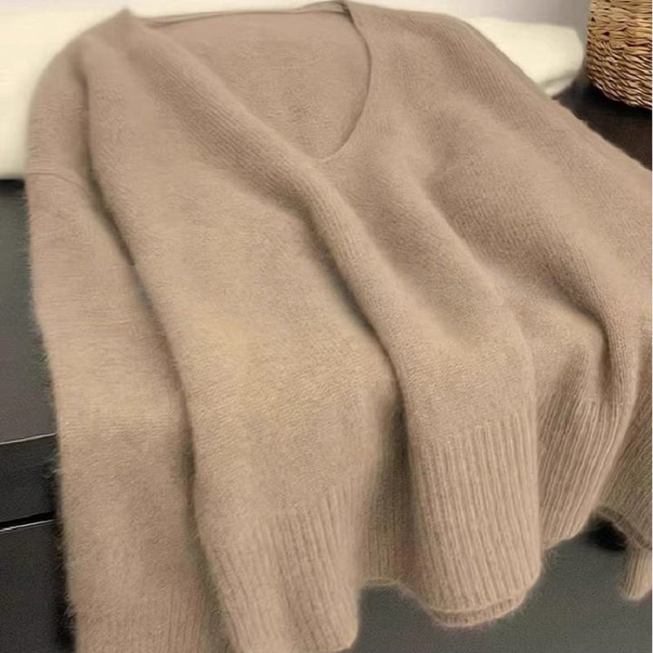 Femme élégant pull V en col avec structure côtelée et coupe décontractée Chic & Stil