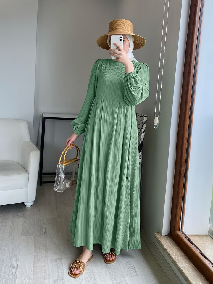 Maxi dress for women with an elegant pleated design and long puff sleeves Lune London