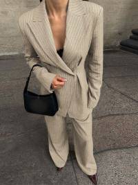 Elegant two-piece suit set for women with double button closure and wide leg Lune London