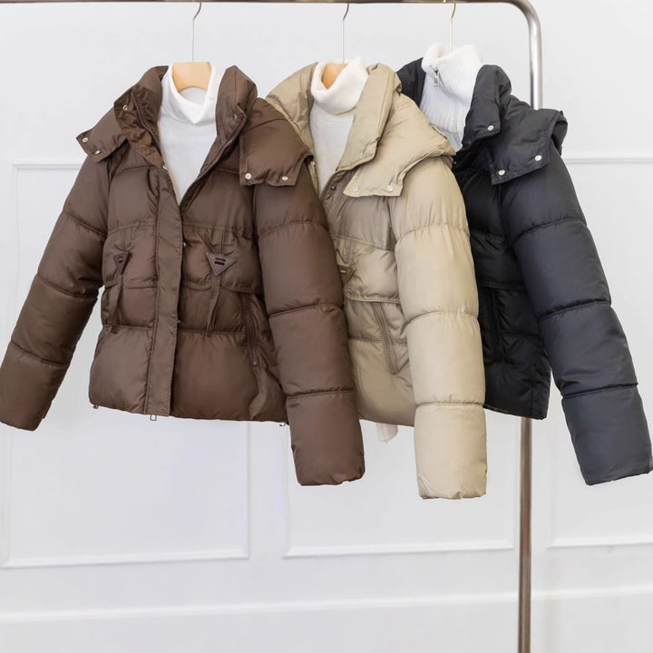 Ladies ultralight puffer jacket with adjustable hood collar and practical zip pockets Lune London