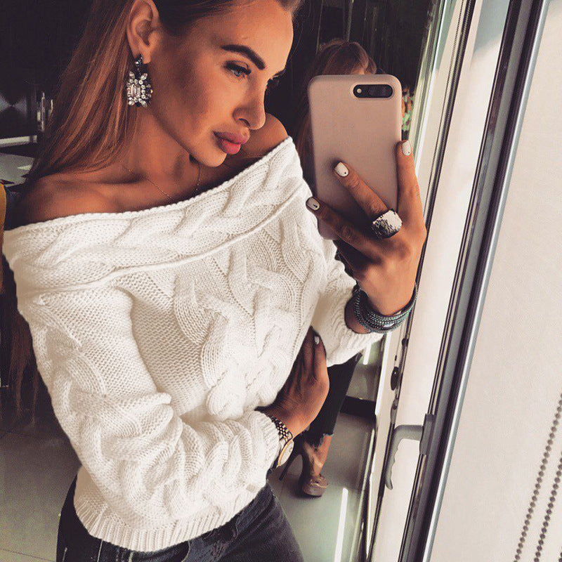 Women's knit sweater with modern cable pattern and chic décolleté silhouette