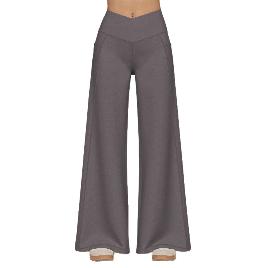 Elegant high-waisted casual trousers for women, with wide legs and practical pockets Lune London