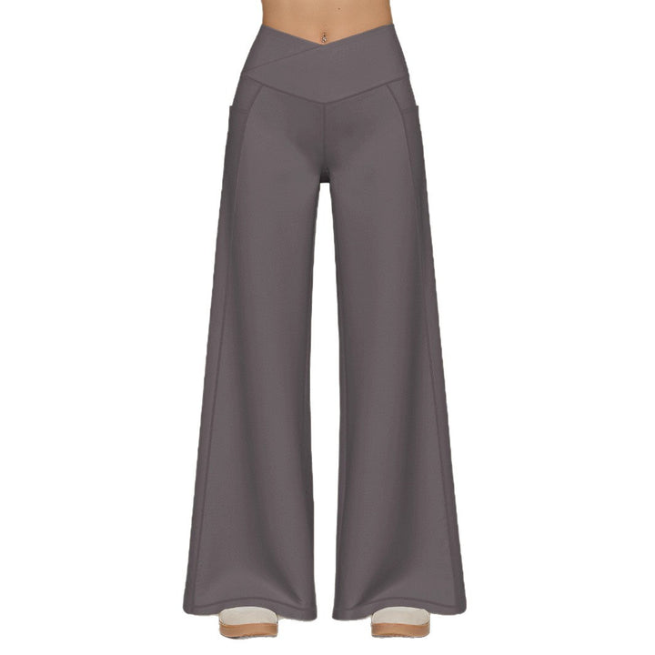 Elegant high-waisted casual trousers for women, with wide legs and practical pockets Lune London
