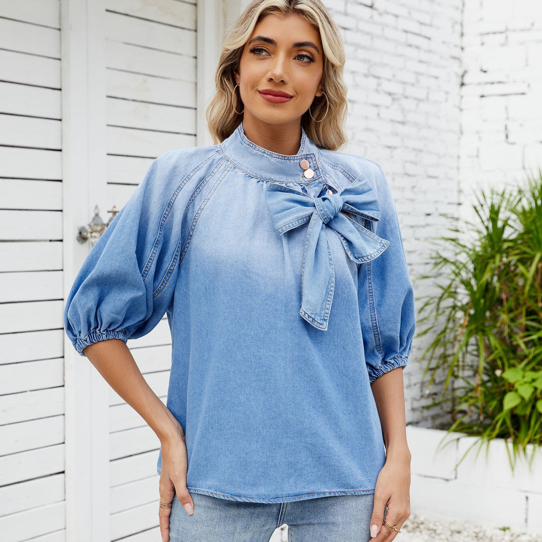Denim blouse for women with decorative knot detail and feminine puff sleeves Lune London