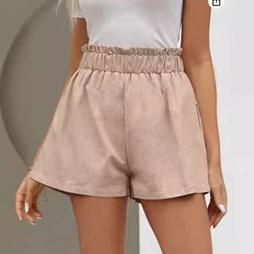 Shorts pour femmes avec taille élastique et poches latérales Chic & Stil