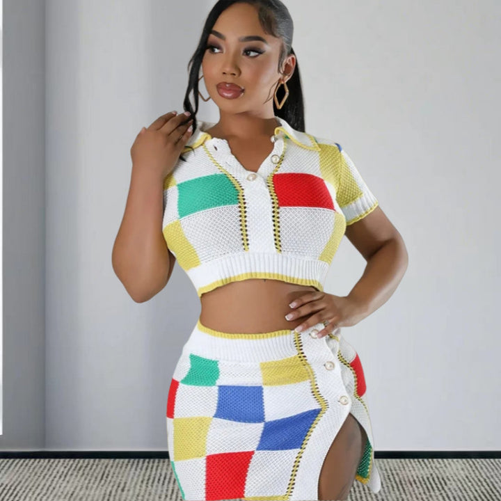 Women's outfit consisting of a trendy crop top and a fitted skirt with button details Lune London