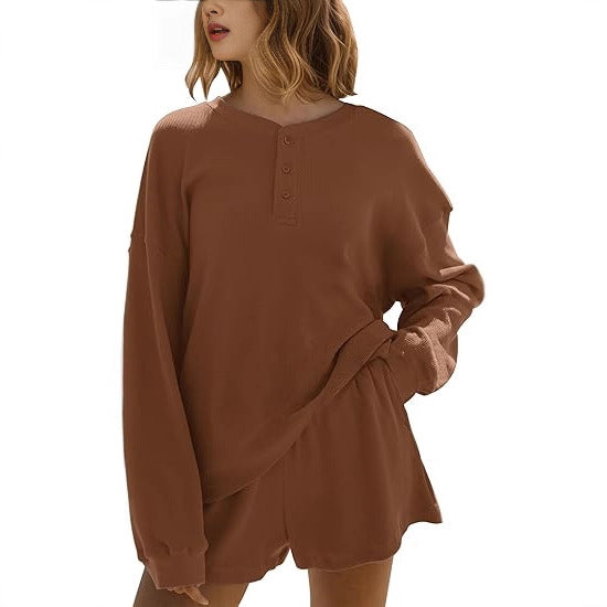 Dames loisirs t-shirt à manches longues pull avec détails de boutons Chic & Stil