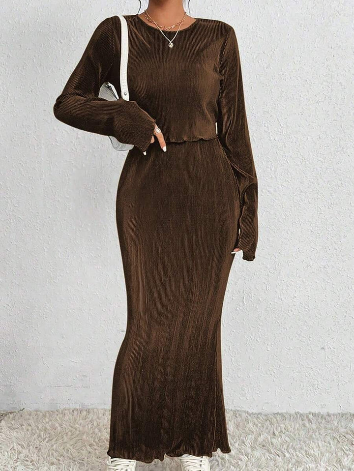 Robe maxi élégante et cintrée pour dames avec des manches longues Chic & Stil